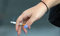 hand holding a cigarette